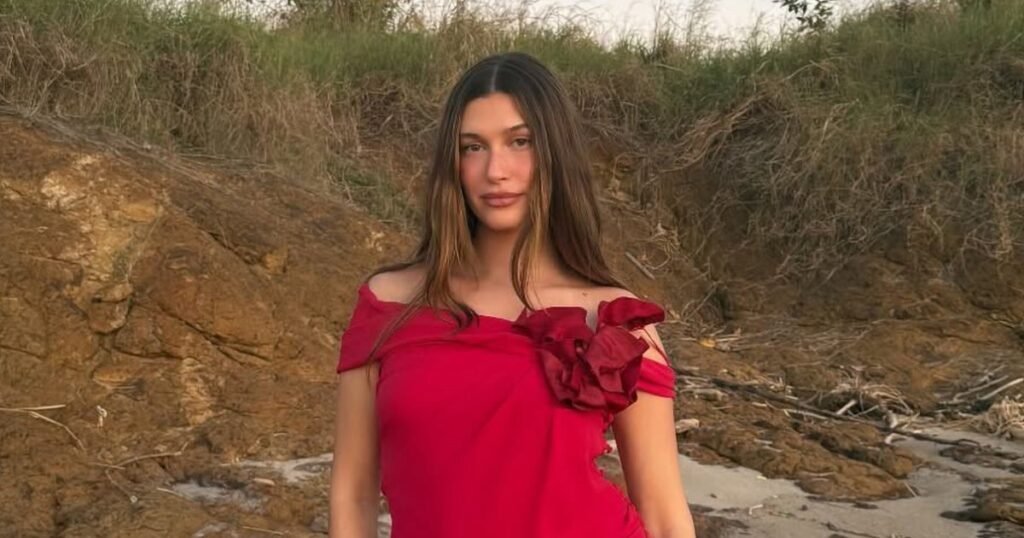 Hailey Bieber Shines in Red During Beach Getaway with Justin Bieber