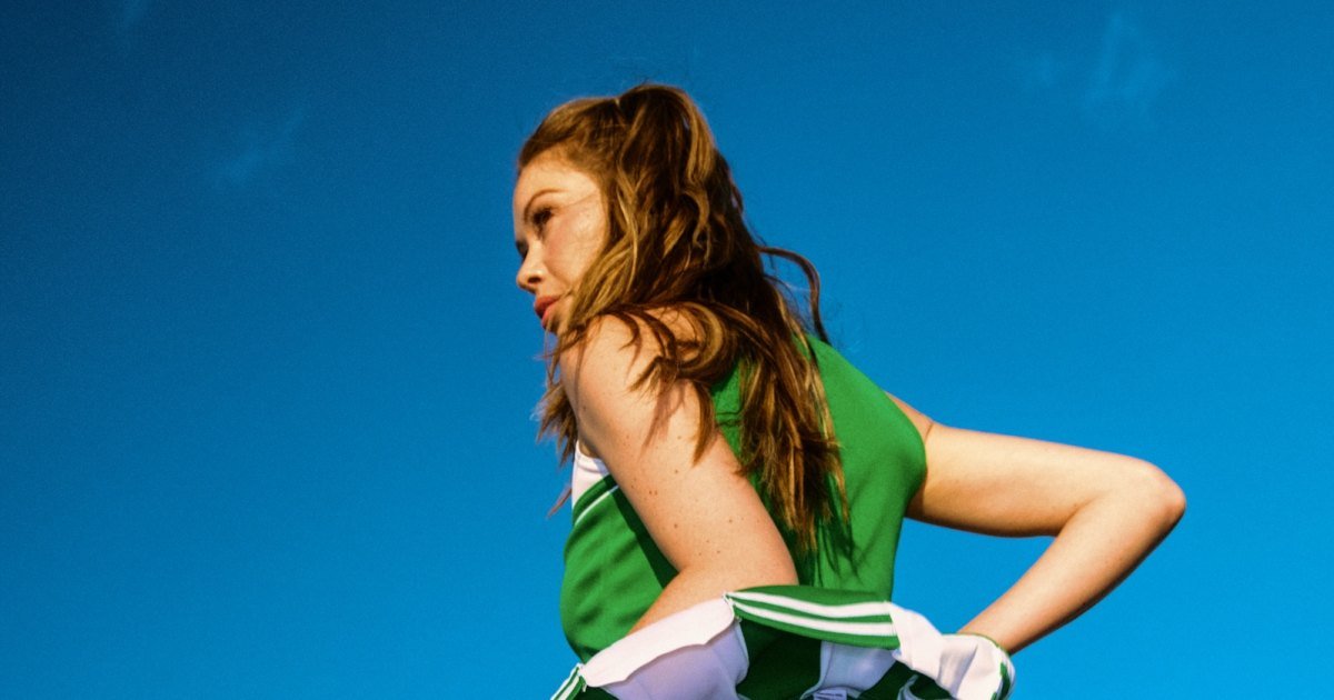 Gabby Windey Transforms Into a Sexy Cheerleader for Flower by Edie Parker Campaign