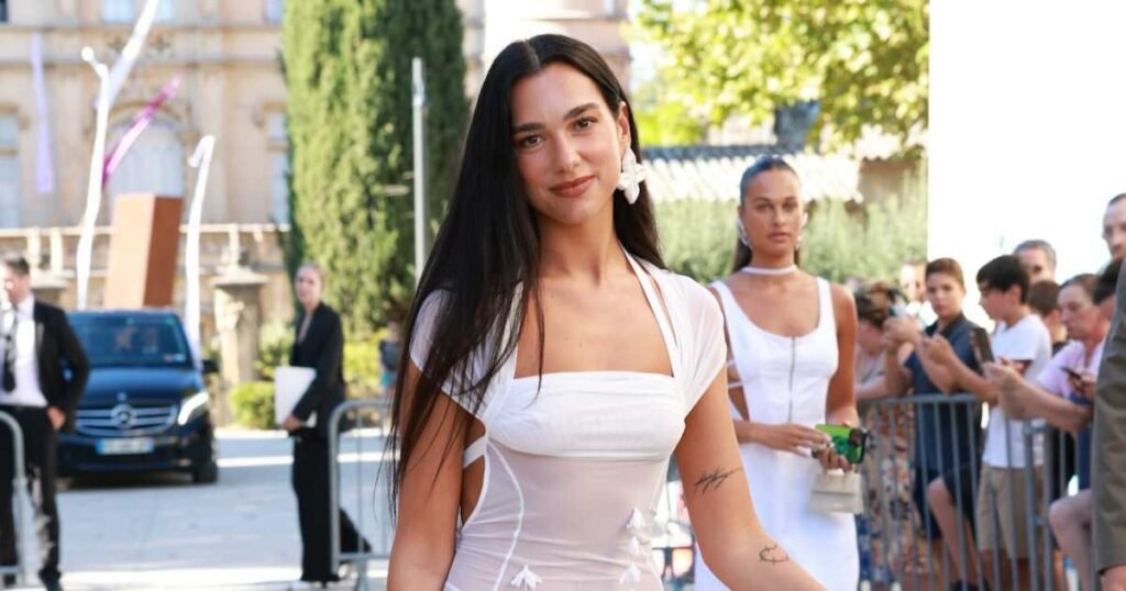 Dua Lipa Responds to Controversy Over White 'Naked' Dress Worn by Wedding Guest