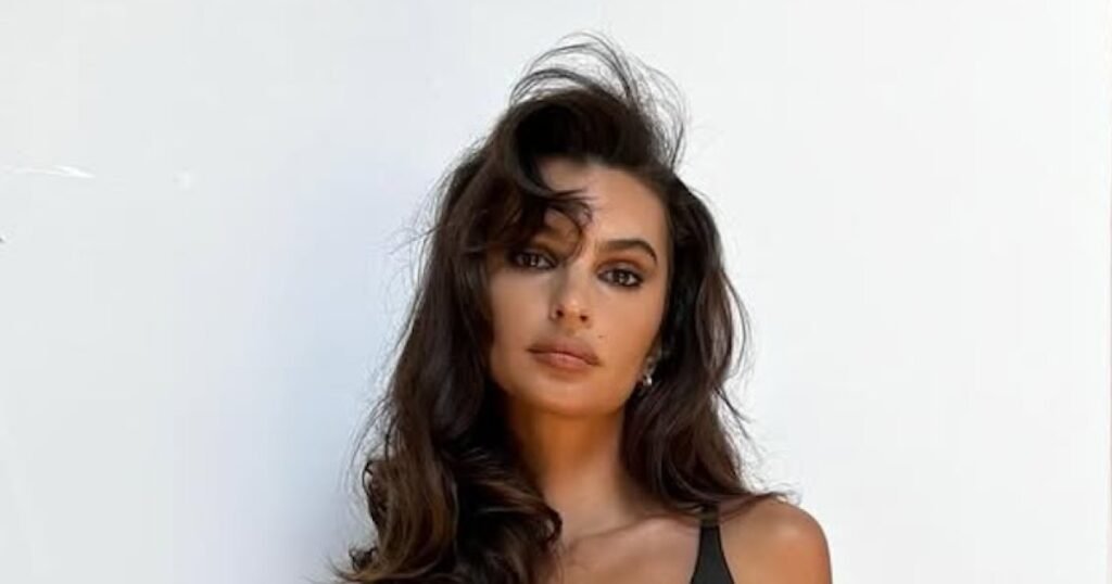 Emily Ratajkowski Struts in Revealing Leather Top and Sheer Trousers