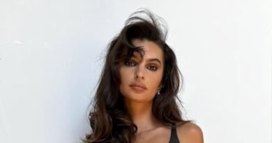 Emily Ratajkowski Struts in Revealing Leather Top and Sheer Trousers