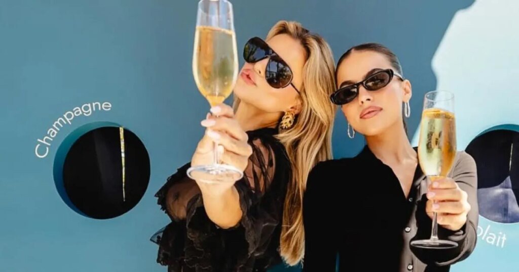 Brooks Nader Dazzles in Sheer Top, Embracing Braless Look for 'Sister Date'