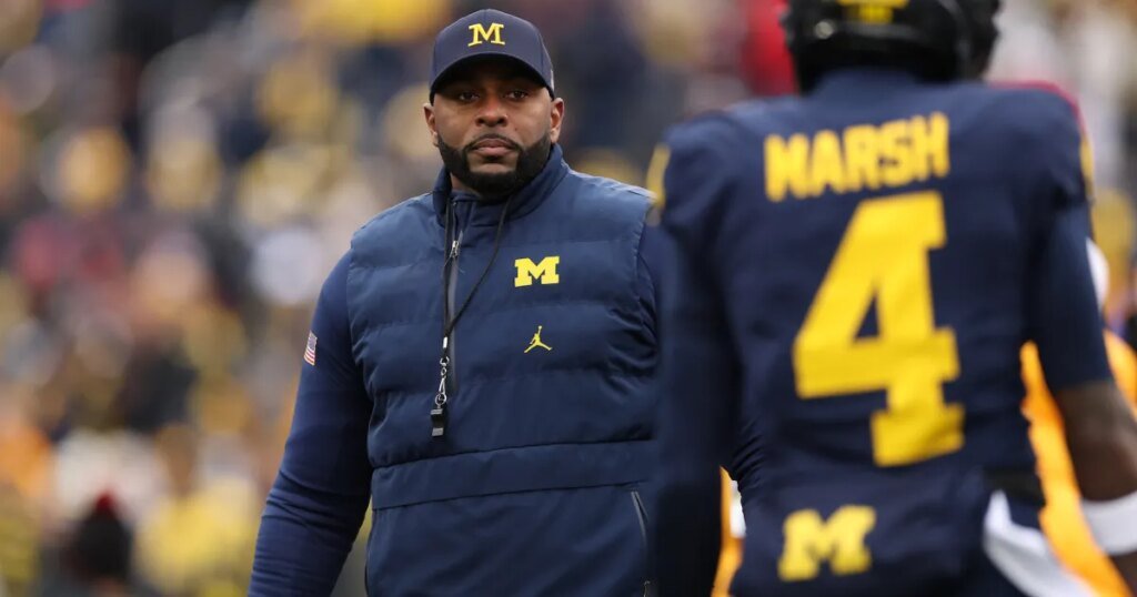 Former Michigan Coach Sherrone Moore Seen with Wife Following His Arrest