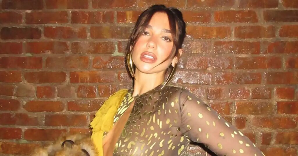 Dua Lipa Sports Sheer Top and New Lighter Brown Hair, Going Braless