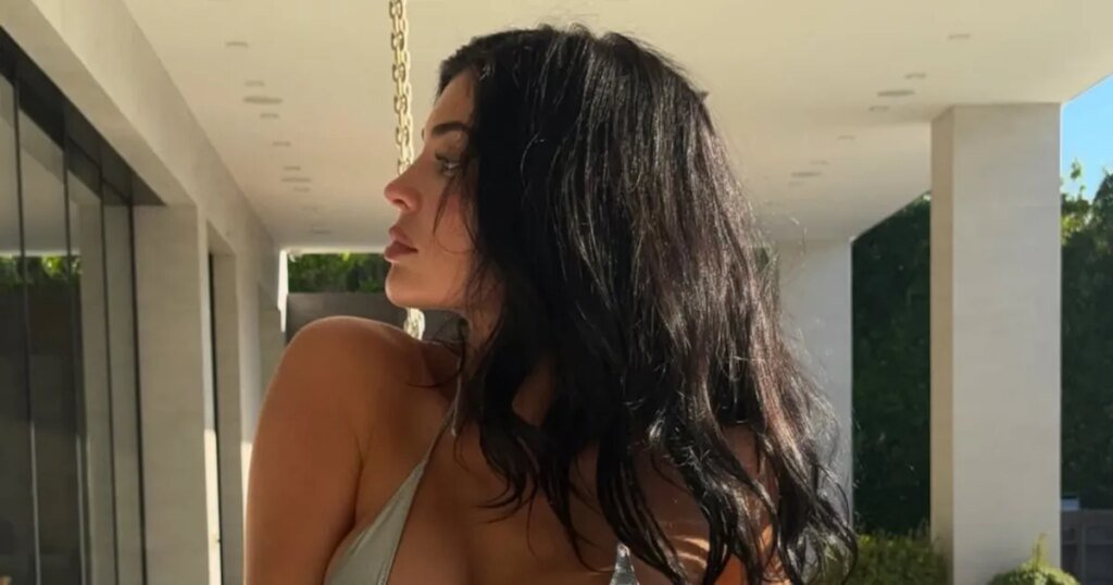 Kylie Jenner Loosens Her Bikini Bottoms in a Striking Chrome Ensemble