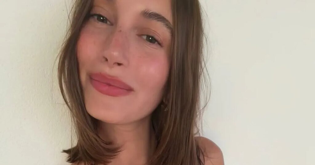 Hailey Bieber Showcases Her Toned Abs in a Leopard-Print Swimsuit