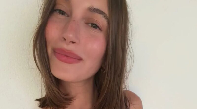 Hailey Bieber Showcases Her Toned Abs in a Leopard-Print Swimsuit