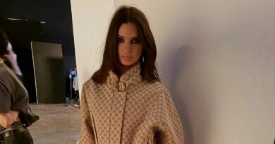 Emily Ratajkowski Strikes a Bold Look in Knee-High Boots Without Pants