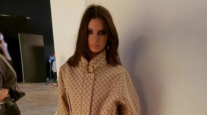 Emily Ratajkowski Strikes a Bold Look in Knee-High Boots Without Pants