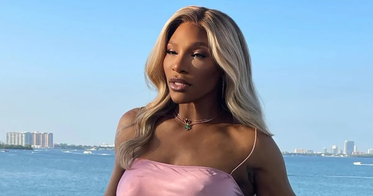 Serena Williams Wears Pink Silk Dress Without a Bra