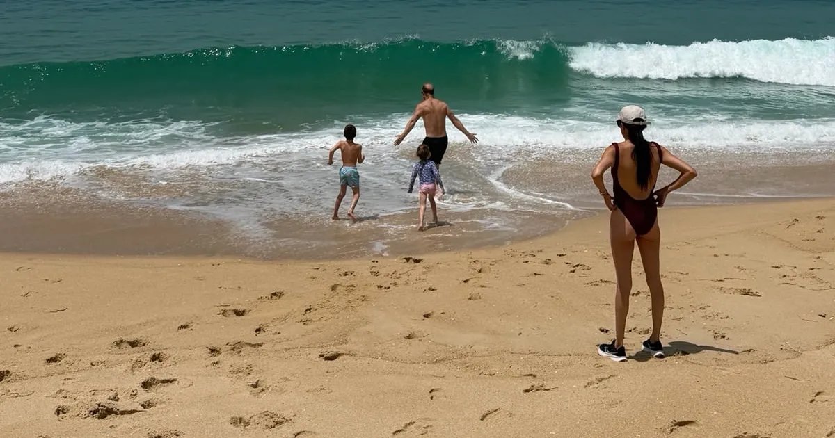 Meghan Markle Stuns in Swimsuit in Exclusive Family Photos